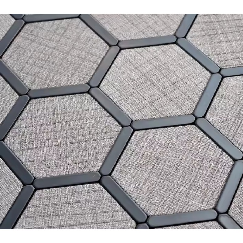 Détail de la texture de la mosaïque adhésive hexagonale gris noir