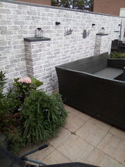 Panneau Mural Beton posé dans le bardage de jardin imitation pierre